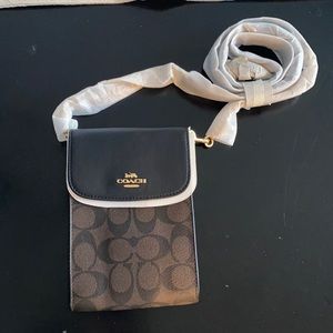 Brand new, never used Coach crossbody! Still in orginal packaging!!